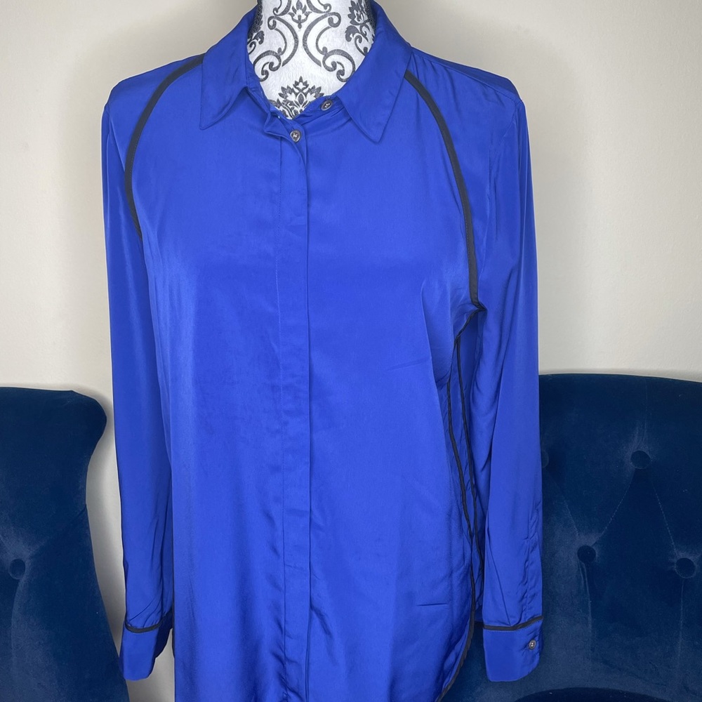 Long sleeve Royal blue blouse w/ black trim.